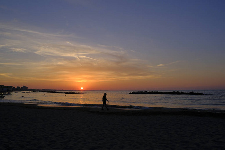 rimini beach beautiful sunset with bright colors and sea 