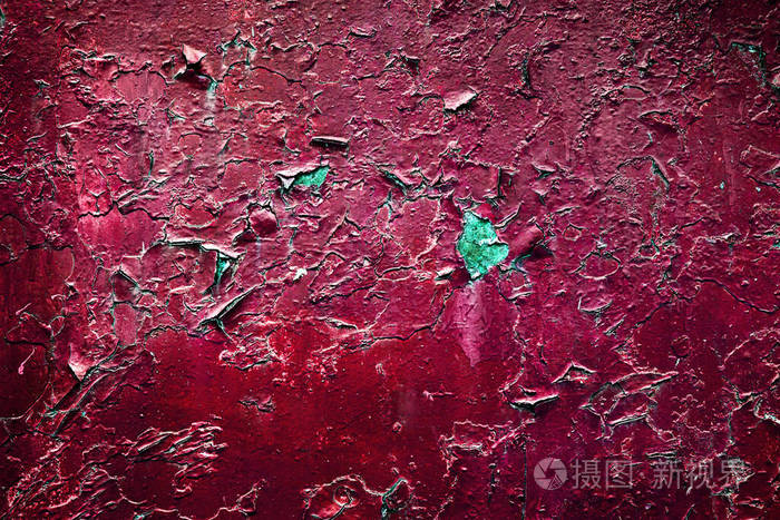 旧的红色裂纹铁皮的粗糙纹理背景