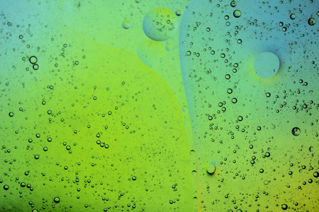 抽象多彩的创意宏观油和水的泡沫背景。