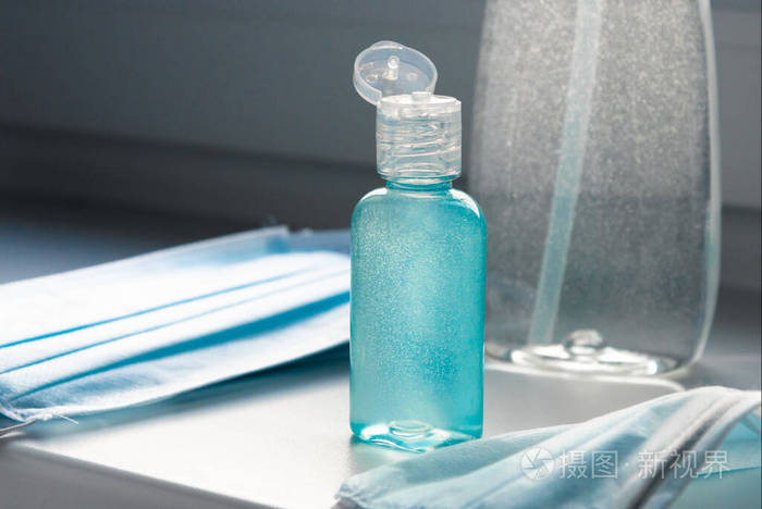 防冠状病毒医用外科口罩洗手液凝胶手部卫生用亮蓝色医用一次性粉色