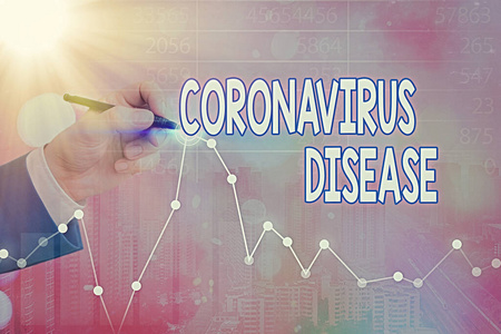 显示冠状病毒病的概念性手写体。商业照片展示了一种新病毒SARSCoV2引起的疾病。