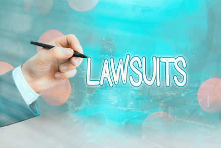 显示诉讼的概念性手写体。商业图片文本提交法院裁决的索赔或争议。