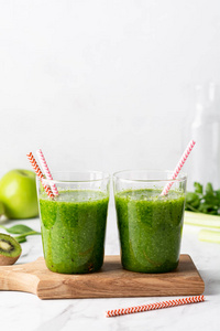 green smoothie of spinach, apple and kiwi 