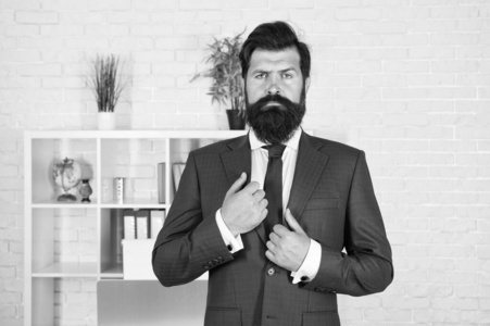 一切井然有序.现代社会的商业生活.老板就是一切照片