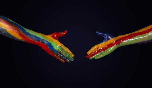 油画手的握手手势多样性概念照片