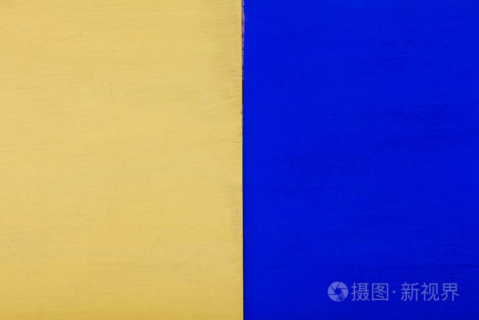 黄蓝相间的墙面结构纹理背景