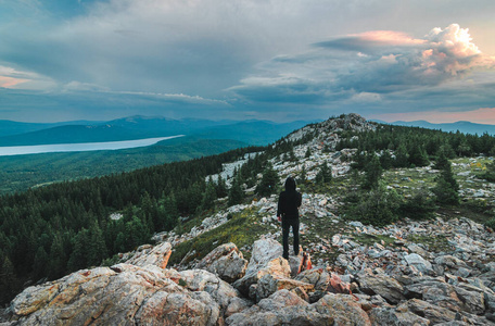 A lonely man in standing at the top of Zyuratkul National Park m