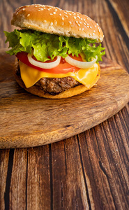 homemade hamburger on a wooden board. 