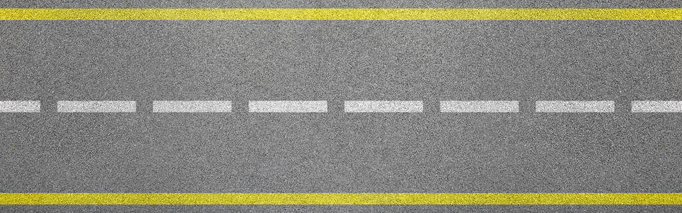 路测试带车道和限制标志的沥青路俯视图照片