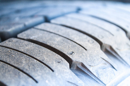 Car tire with little wear. Closeup. 