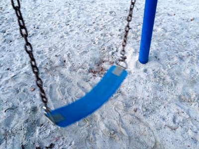 Empty swing at playground