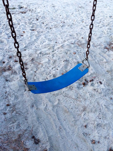 Empty swing at playground