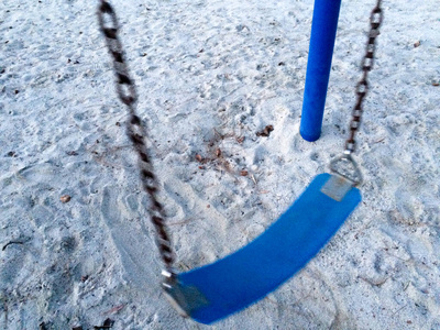 Empty swing at playground