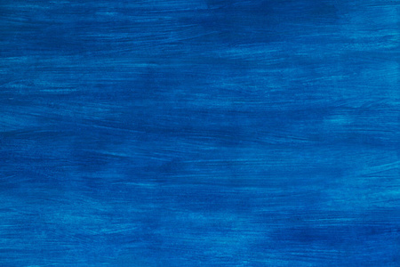 水粉手绘背景手绘水粉画纸在明亮的蓝色背景.