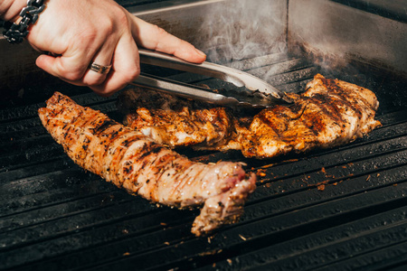 cooking steaks on grill 