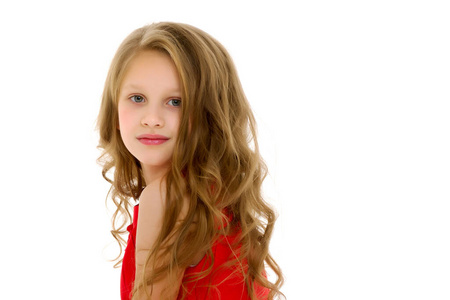 当训练在教室时可爱的小女孩向上指小女孩在白色背景上向上指可暗的