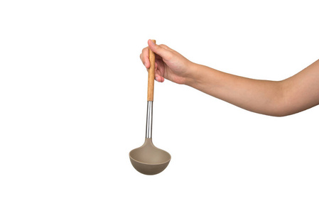 手里拿着便宜的小勺子图片