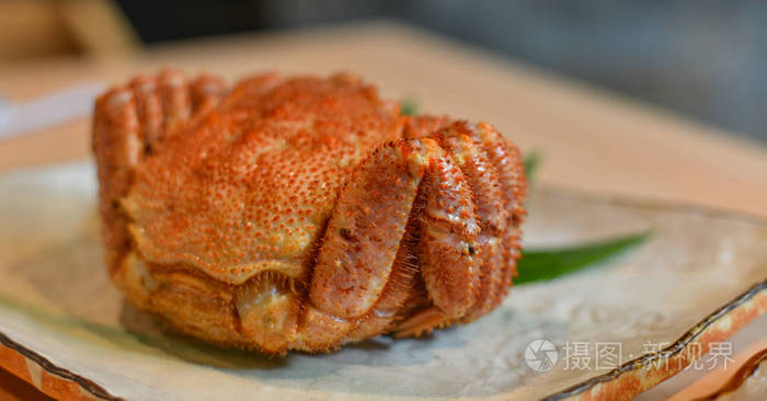 Fresh Japanese crab on wooden table 