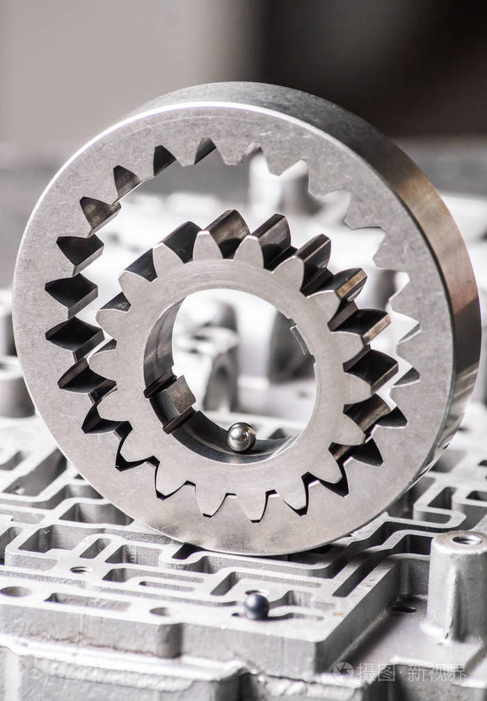 变速箱旧金属部件的背景和图案脑电传动和齿轮