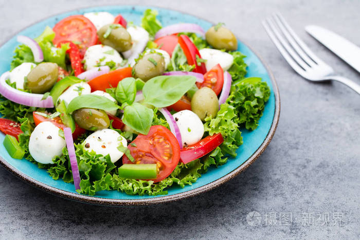 vegetablesaladwithcheesemozzarellatomatoesbasilikumand