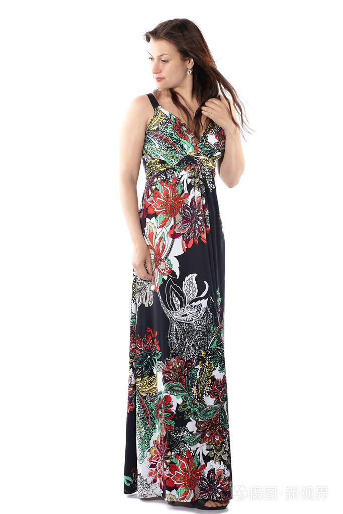 年轻漂亮的女人,穿着五颜六色的花朵图案,全身肖像