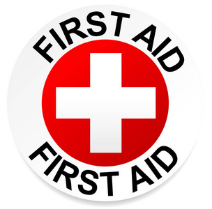 带白色交叉颜色的急救徽章照片