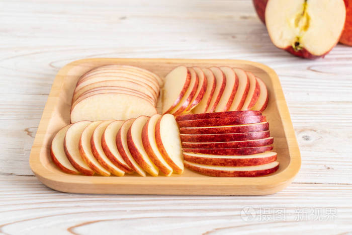 鲜红苹果片碗照片-正版商用图片2hmb54-摄图新视界