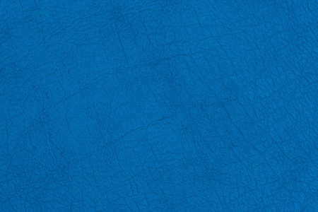 深蓝色纹理皮革背景.照片