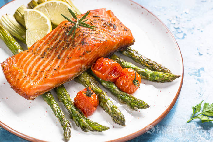 grilled salmon fish fillet with asparagus.