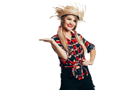 一名巴西妇女,穿着典型的服装参加朱丽娜节照片