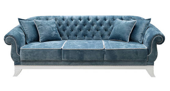 沙发的背面用马车扣件装饰.白色优雅底座照片