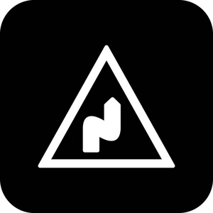 警告符号用在瑞士-双弯,先向左4辆汽车在夜间行驶一个双弯道时,前车和