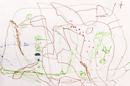 一个小朋友孩子在墙上乱涂彩色铅笔在一个小朋友做的白色墙上乱画