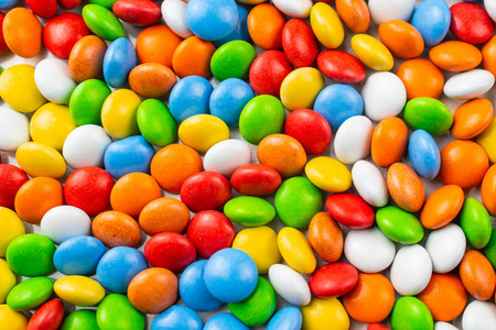 釉面的糖果明亮的彩色背景与釉面糖果照片
