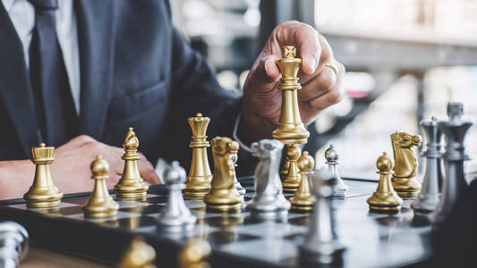 商人下棋,为suc谋划战略照片