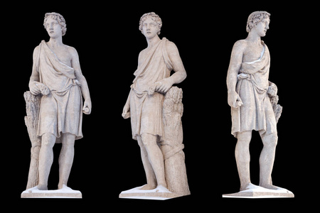 古希腊阿多尼斯孤立神的雕塑.阿多尼斯是一位美丽欲望和植物之神.照片