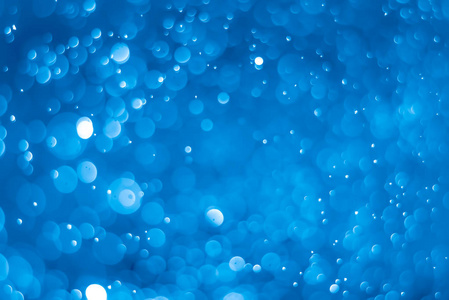 浅蓝色背景的抽象柔和波克灯光效果照片