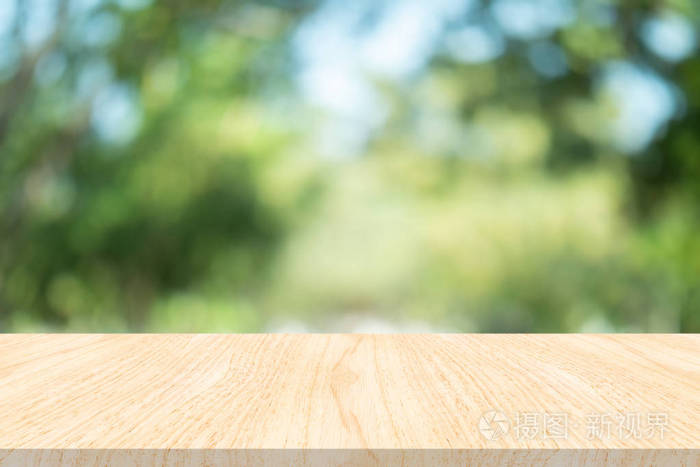 Empty wood table on blurred background copy space for montage yo