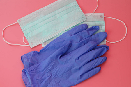 处理口罩一次性医用口罩和乳胶手套.医疗箱基本一次性用品.照片