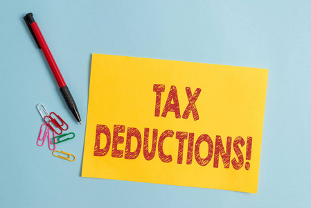 概念意味着可以减少开支的可征税收入普通纸板和文字设备置于粉彩背景