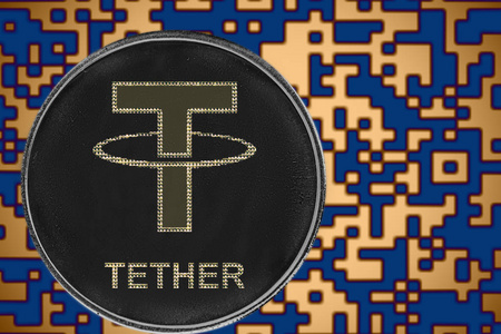 usdtToken usdt tether coin cryptocurrency on the background of gold 照片