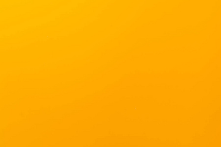 带有哑光纹理的黄色纯色背景.壁纸设计照片