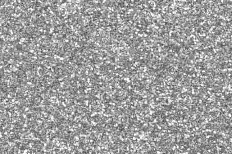 小亮片银色装饰亮片.背景图像中有来自小元素的闪亮的bokeh光照片