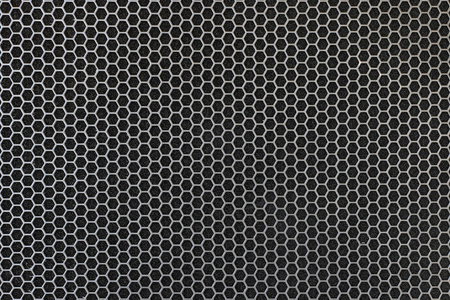 喇叭孔黑色铁喇叭网格纹理.行业背景.照片