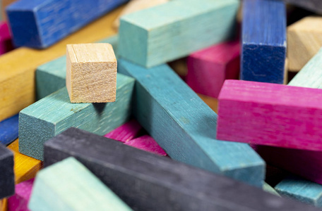 vintage set of cuisenaire rods stacked in random pile against a