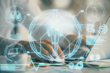 科学全息图,背景是人类在计算机上工作.学习的概念.双重曝光.照片