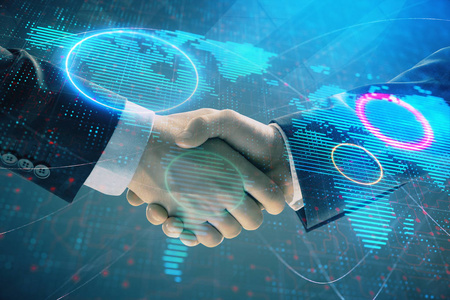 两位商人握手,在抽象背景下多次曝光世界地图.国际商务概念照片