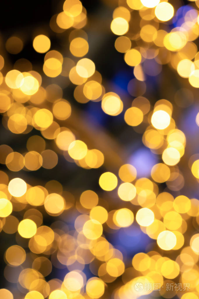 垂直设计明亮的蓝色节日背景金色灯光大量散焦基地