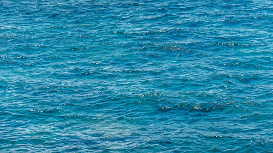 天然蓝色海面.海水背景.热带海滩海岸线照片