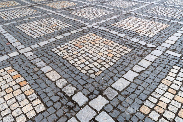 城市中心的古德国鹅卵石图案.小花岗岩铺路石.古色古香的灰色人行道.